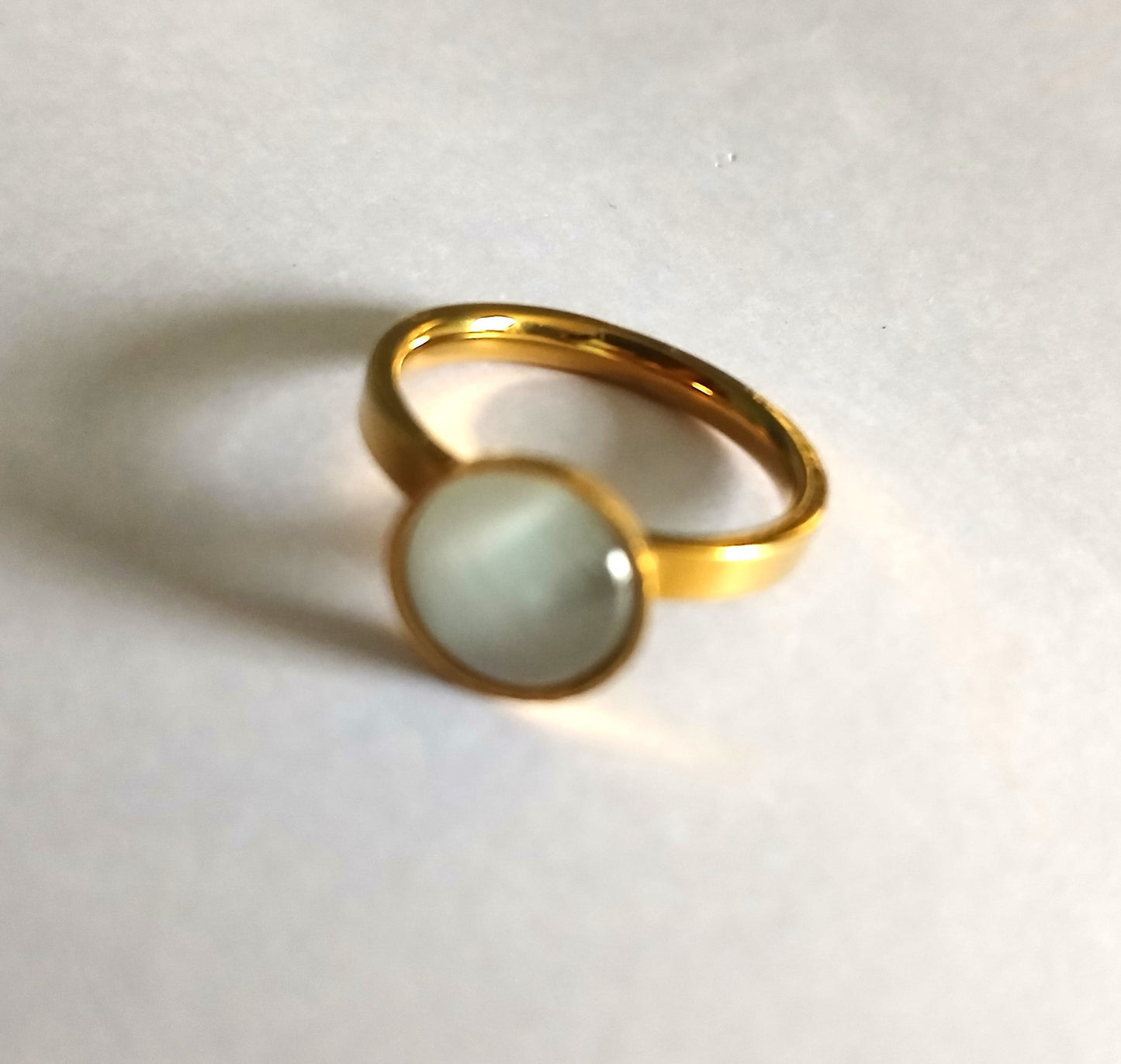 Stylish Gold-Colored Ring with Moonstone for Both Men and Women.
