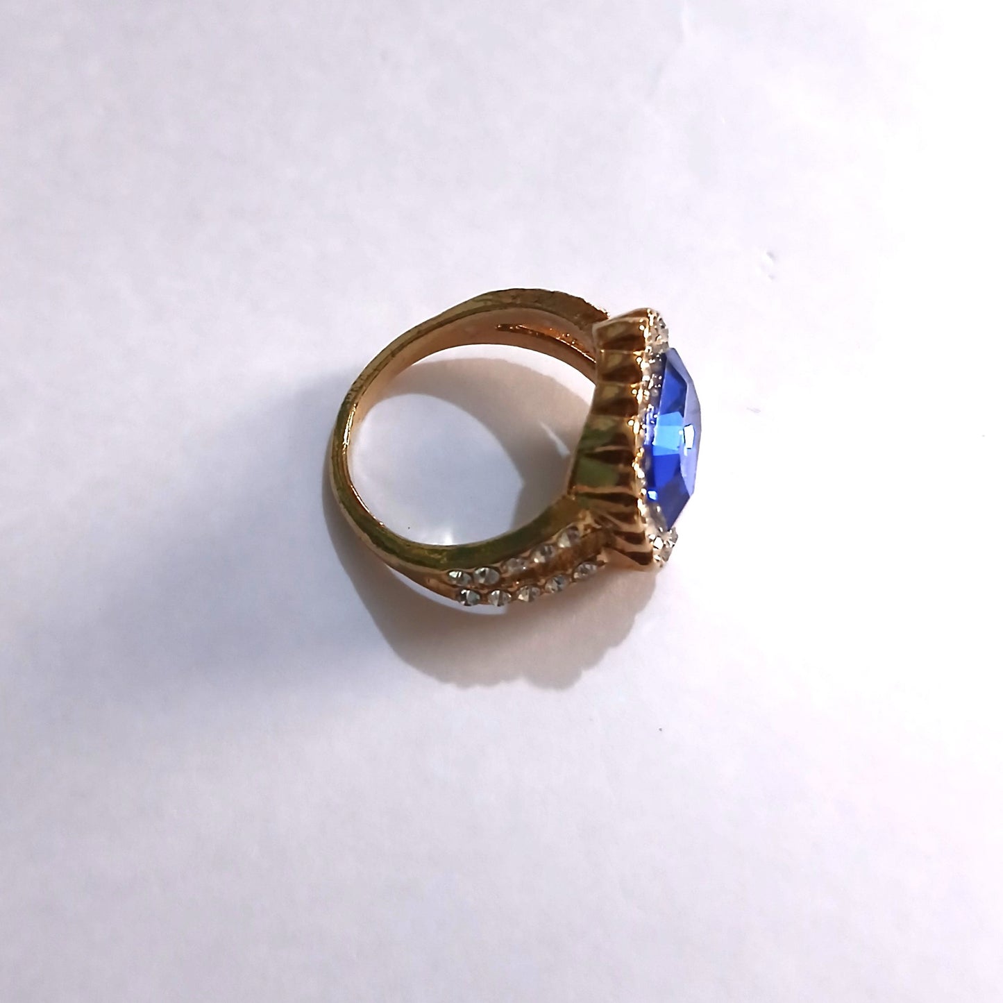 Blue Topaz Gemstone Ring Set in a Shimmering Gold Color