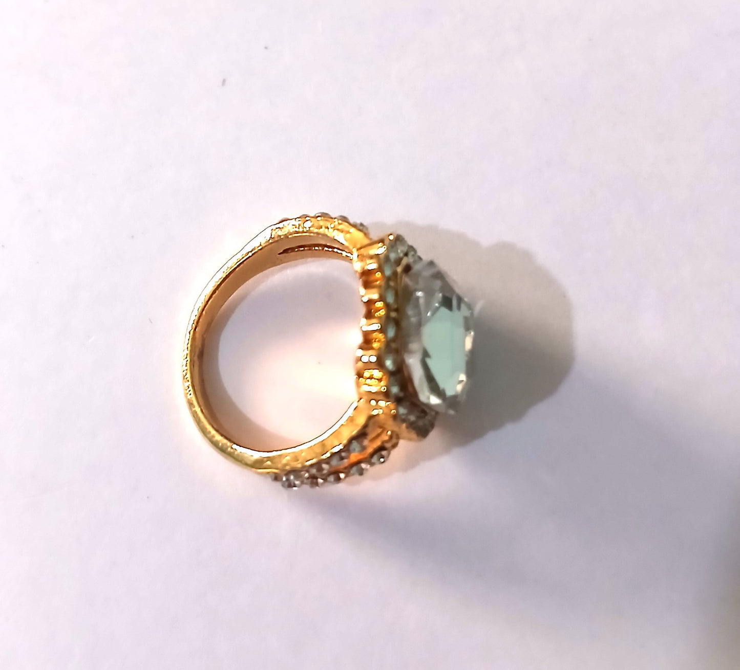 Fashion Ring with a Refined Gold-Colored Band, Sparkling Topaz Gemstones.
