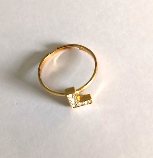 Gold-Colored Ring with Letter "L" Adorned with Shining Small Gemstones