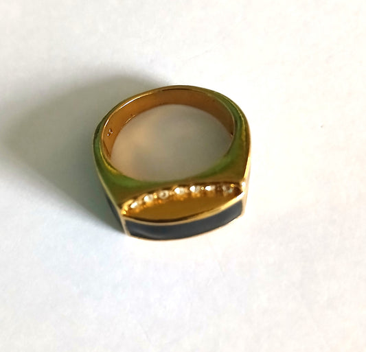 Unique Men's Statement Ring with a Bold Black Gemstone Set in a Gold-Colored Band.