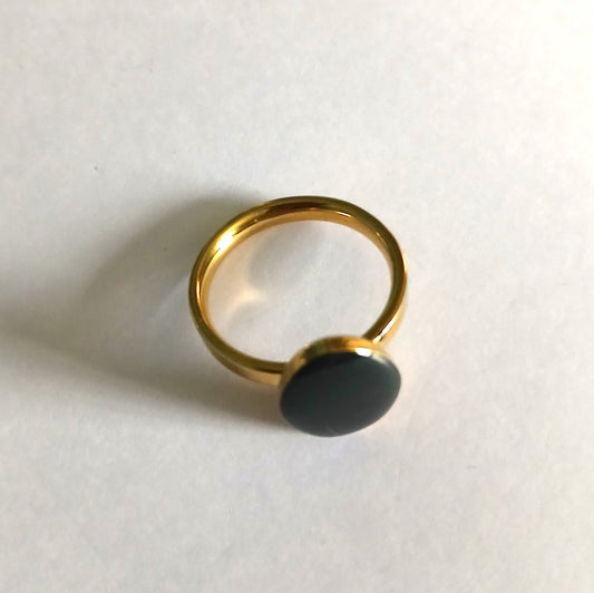 Ring with a Black Bead  in an Elegant Egg Shape