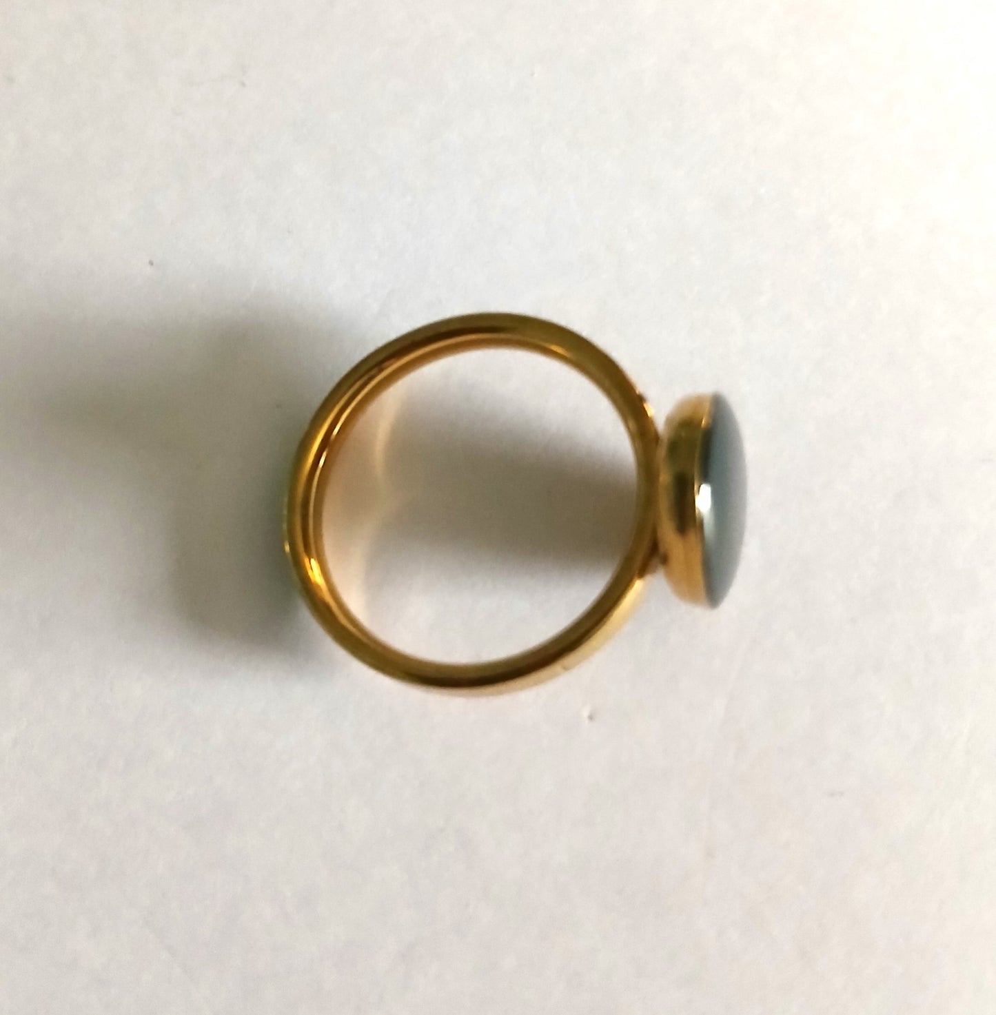 Ring with a Black Bead  in an Elegant Egg Shape