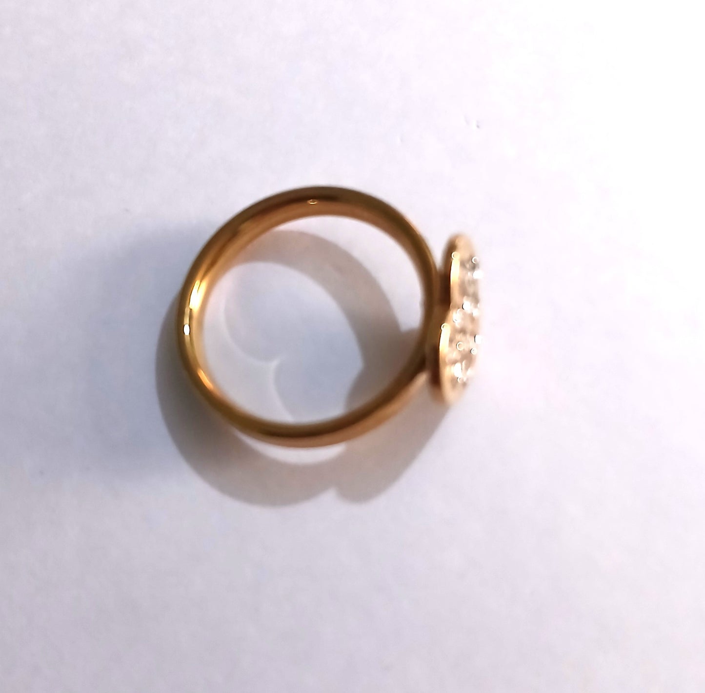 Heart-Shaped Ring with the Warmth of Gold with Shimmering Silver Gemstones