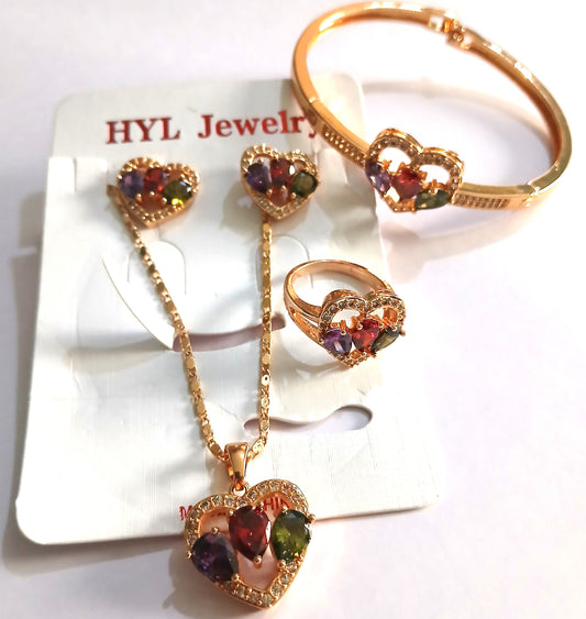 Jewelry Set Featuring a Statement Ring, Bracelet, Pendant necklace, and Earrings