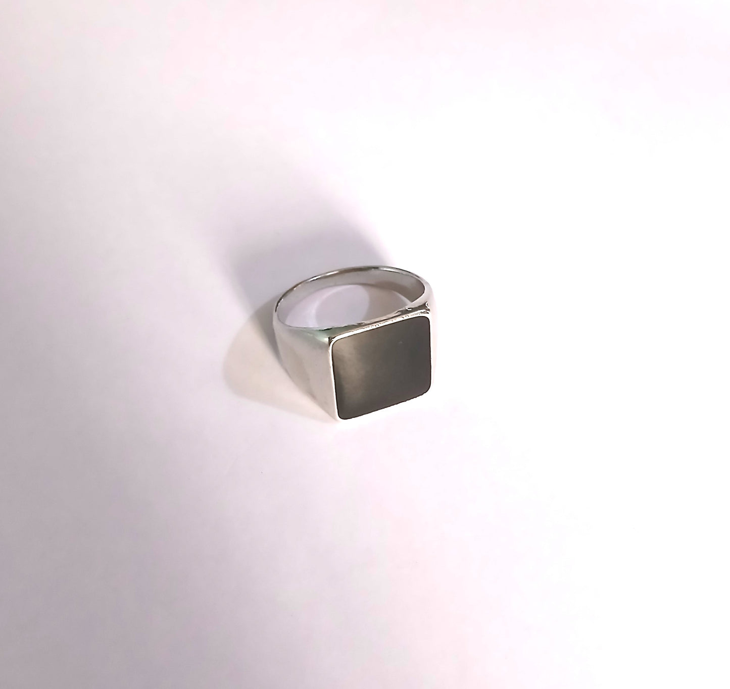 Silver Ring Features a Shiny Black Finish like Topaz