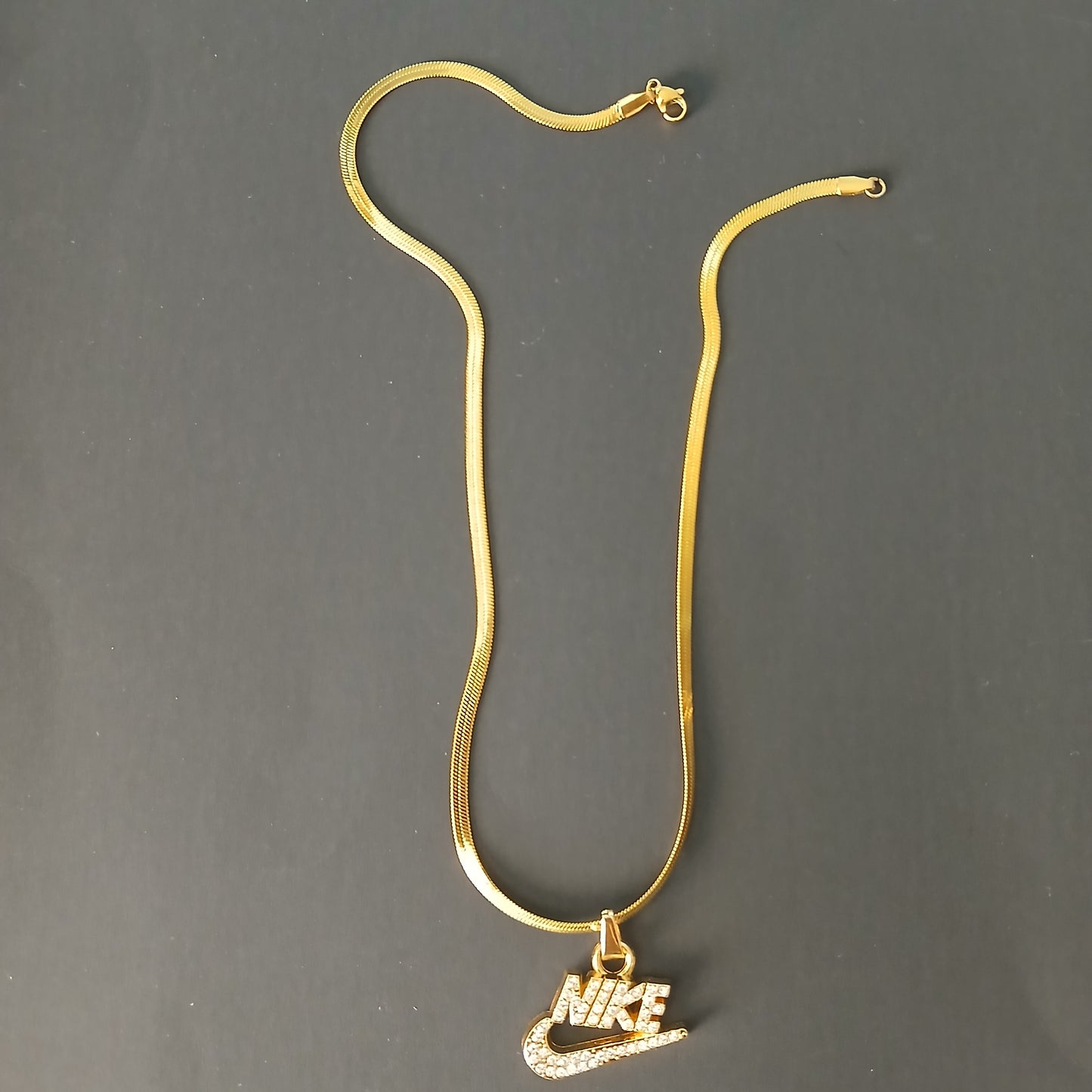 Sterling Gold Initial Necklace with Nike Pendant Unisex Design from South C and South B Nairobi